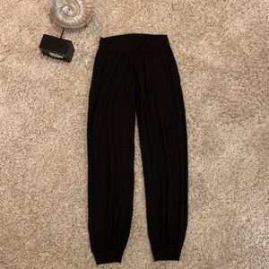 Black yoga pants with open side size small.